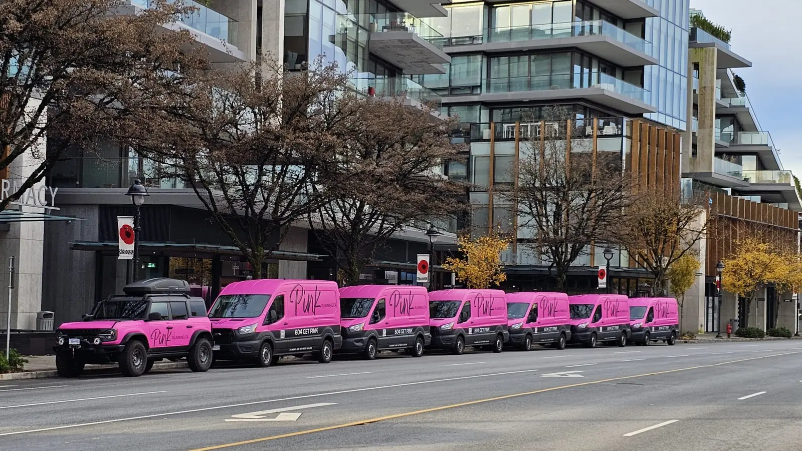 The original Pink Plumbing service fleet in North Vancouver